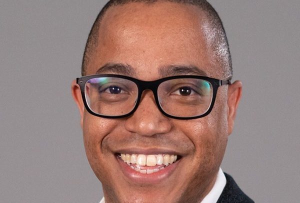 A headshot of Dr. Sean Mondesire.